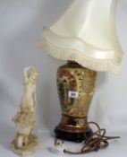 A large reproduction Chinese style porcelain lamp with shade and resin figure of a lady with