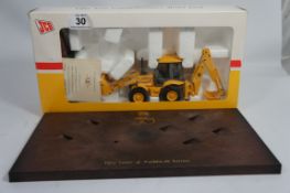 Boxed JCB Limited Edition Toy Figure Group