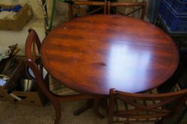 Reproduction Yew Wood Dining room suite comprising of circular extending Dining Table, Four chairs