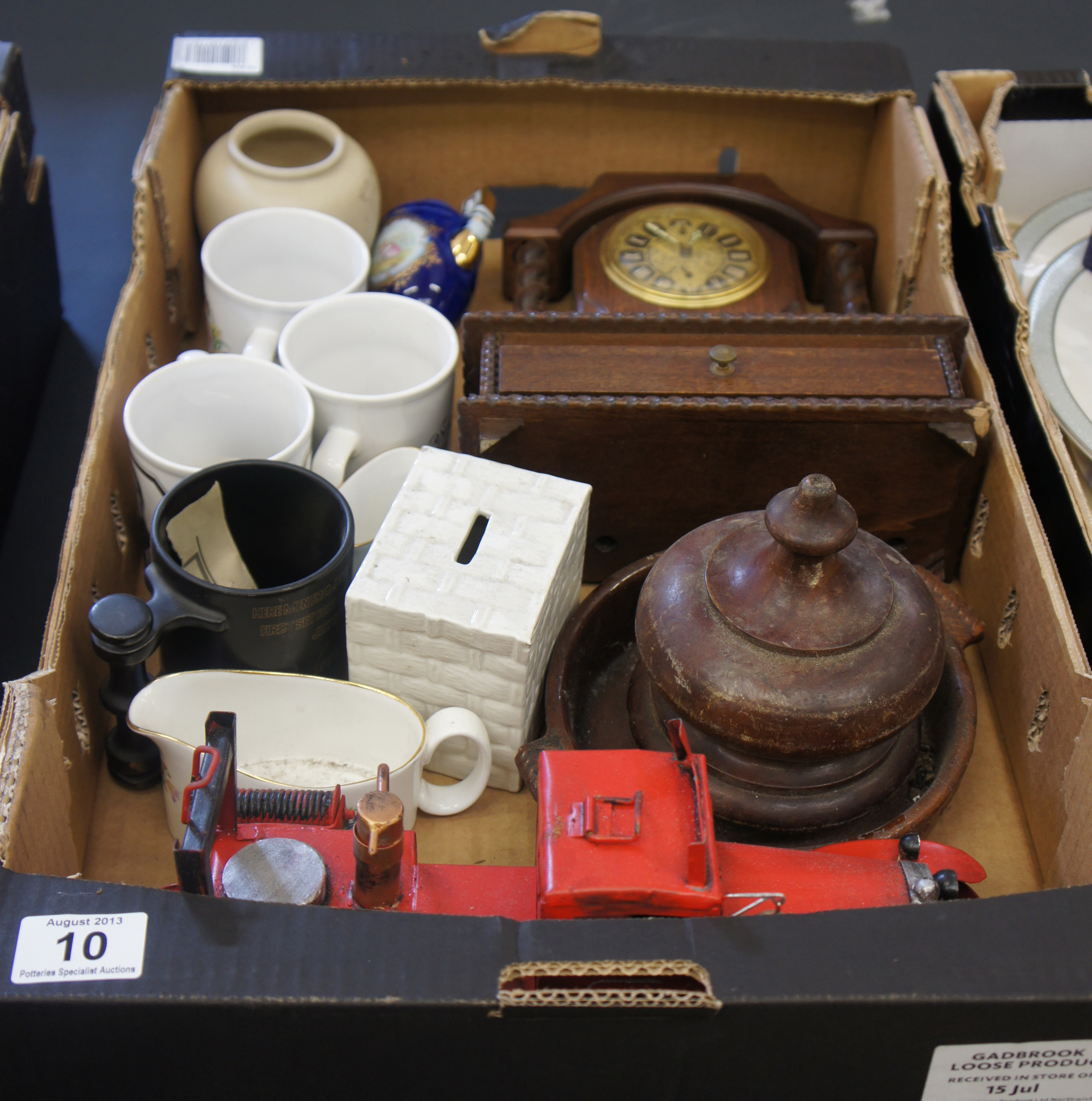 A collection of various Items to include Commemorative Mugs, Tin Fire Engine, Oak Berometer, Bric