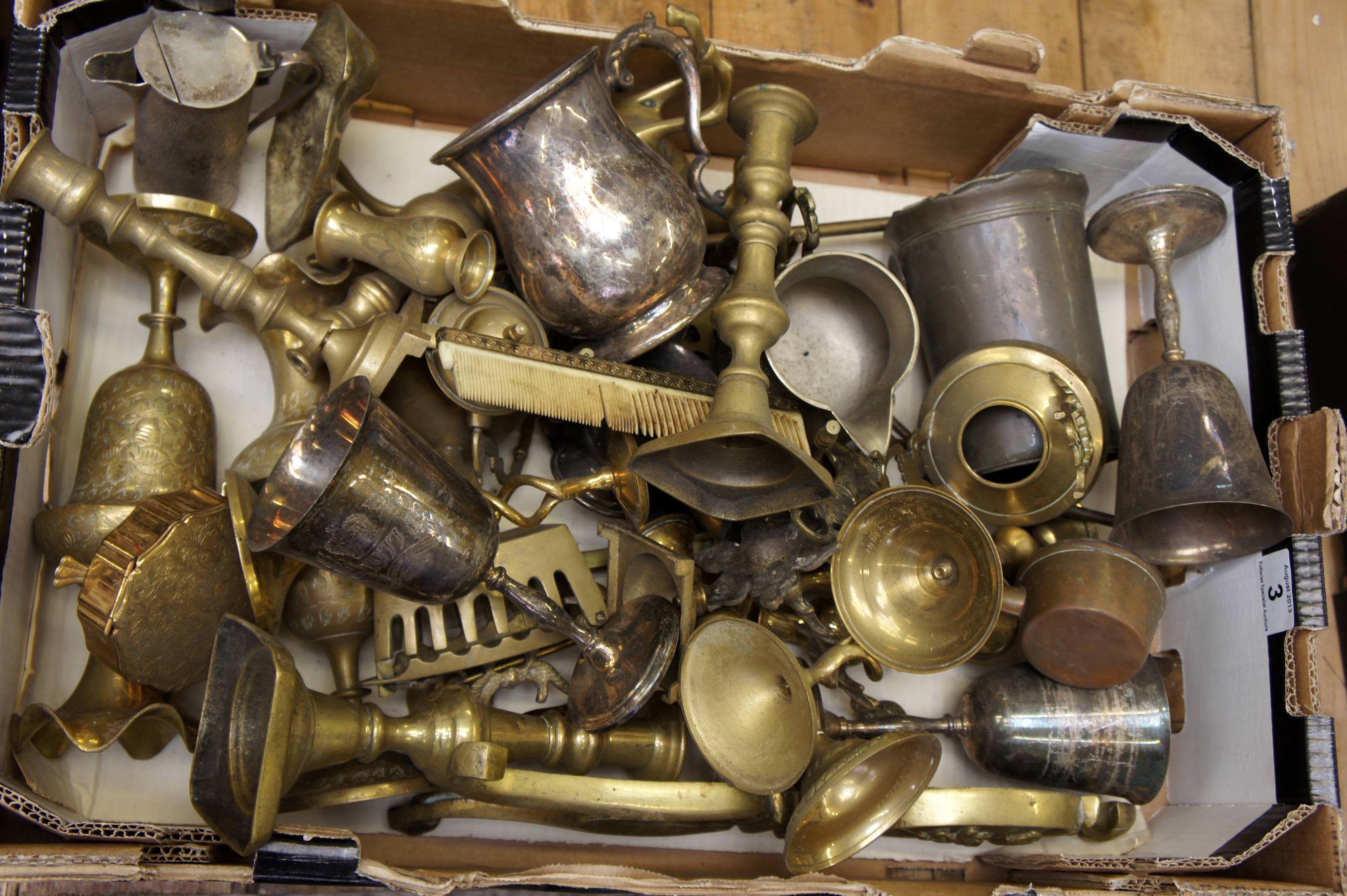 A collection of Brass and Silver Plate items to include Candlesticks, Commemorative Items, Goblets