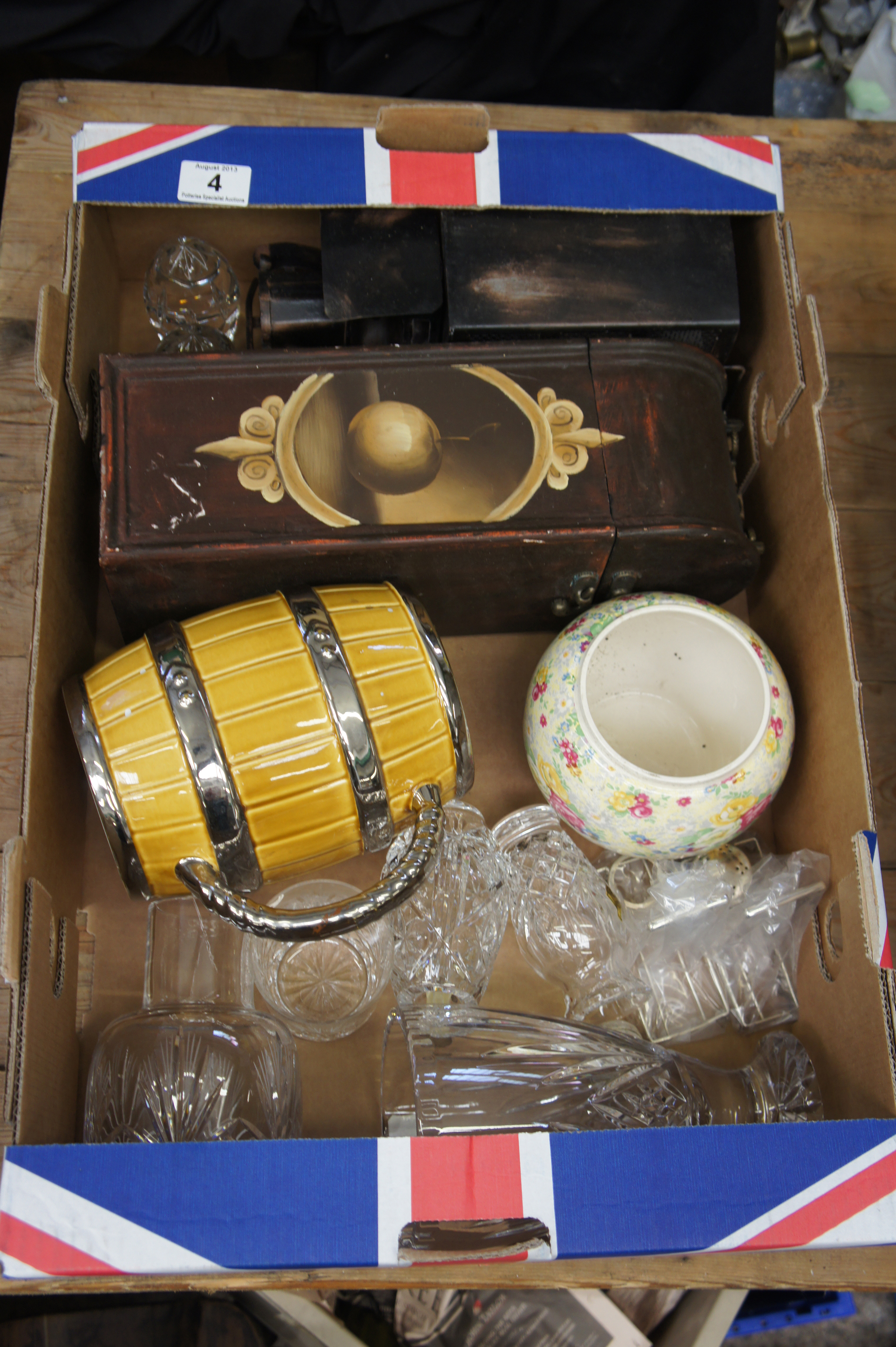 A collection of items to include a Wood Painted Wine Box, Old Tin Toy Car, Wade Barrel and Cut Glass