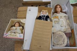 A collection of Porcelain Dolls to include a Avon Doll Isabella, Collectors Choice Boxed Musical