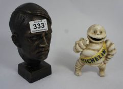 Cast Iron Novelty Moneybox in the Form of the Michelin Bibendum and a Cast Iron Bust of Adolf Hitler