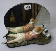 A Decorative Mirror with a China Figure of a Boy and Frog