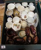 A collection of pottery to include Commemorative Mugs, Noddy Ware Animals and Jugs etc