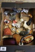 A collection of Pottery Cats to include Royal Doulton Past Times, Border Fine Arts etc