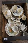 A collection of Pottery to include Plates, Commemorative Mugs etc