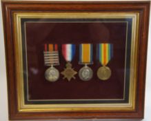 Framed Group of Four Medals Relating to PTE A T Moss AVC Regiment North Staffs consisting of Queen
