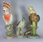 Royal Dux Large Model of a Parrot on Branch, Heron eating Fish and an unmarked Model of Bird of
