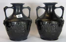 Pair of Portland Embossed Two Handled Vases in a Black Matt no factory markings, 26cm