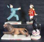 A set of Guiness Advertising Figures comprising Lion, Sealion, Zookeeper and Ringmaster all