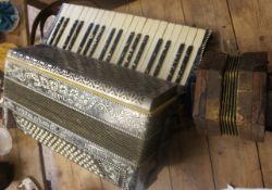 A Castelfidardo of Italy Soprani Paolo Piano Organ together with a Steel Reeds Rose Wood Squeeze Box