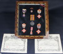 Framed Set of British Red Cross Society Medals with documents and certificates of ownership dating