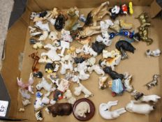 A collection of Miniature Pottery, Glass and Metal Dog Ornaments (50)
