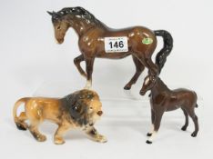 Beswick Stocky Jogging Mare 1040 and Doulton Foal 1816 with an unmarked figure of a Lion (some light