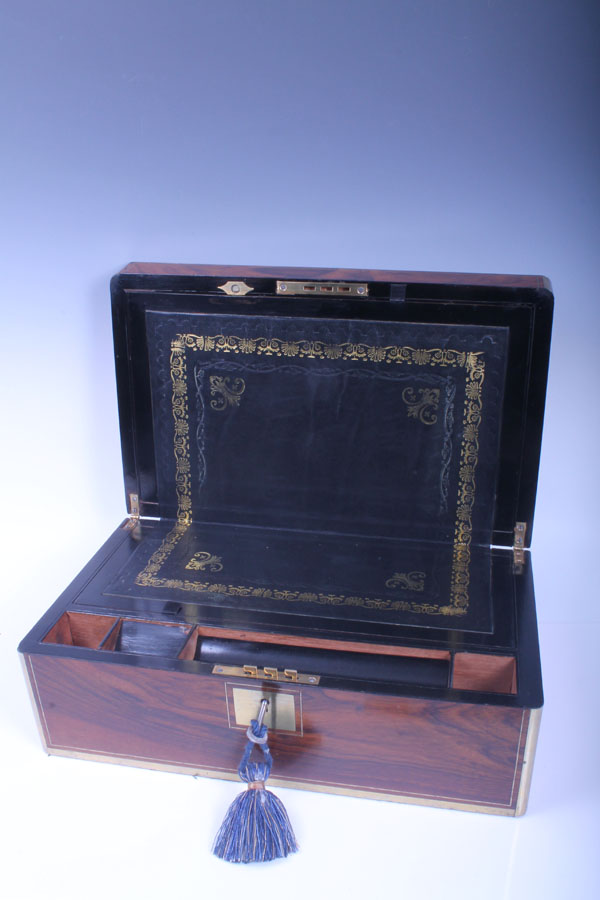 Victorian walnut and brass bound writing box with a tooled black leather-lined slope, 16.5cm high