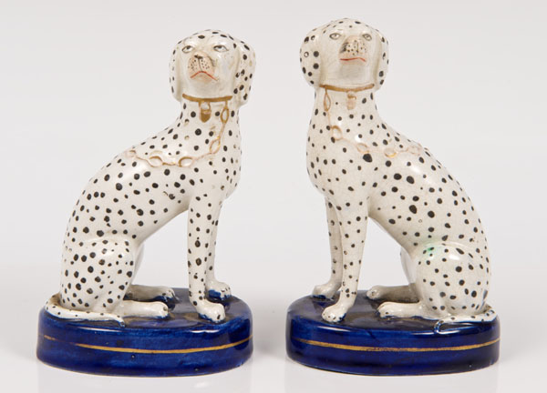 Pair late nineteenth century Staffordshire seated Dalmatian dog ornaments with gilt collars and