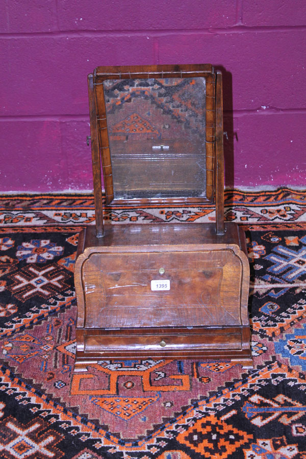 Eighteenth century and later walnut toilet mirror / bureau with crossbanded and feather strung