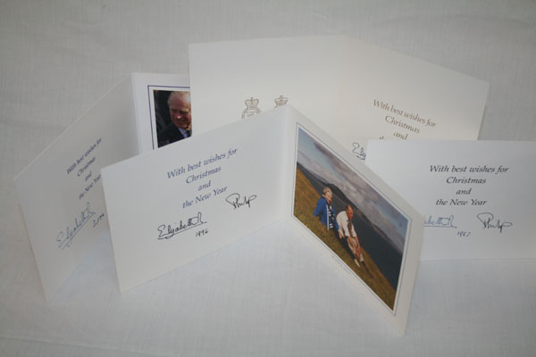 HM Queen Elizabeth II and The Duke of Edinburgh - four signed Christmas cards with gilt Royal