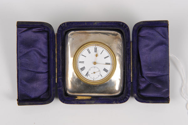 Edwardian silver cased travelling desk clock of rectangular cushion form, Swiss movement with
