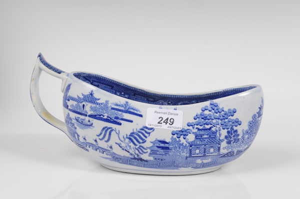 Early nineteenth century English pearlware blue and white bourdaloue, circa 1820, with printed