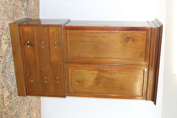 Edwardian inlaid mahogany linen press on chest, the crossbanded doors enclosing four trays, above