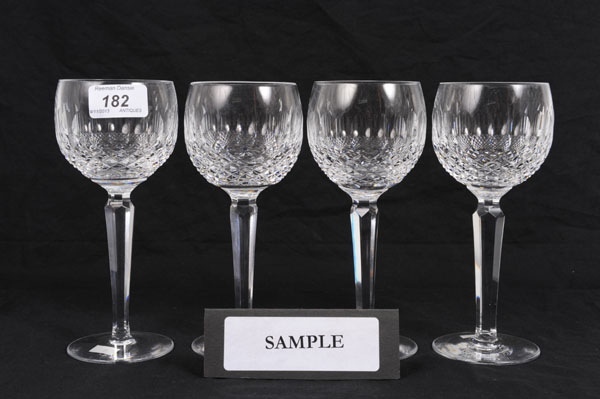 Set of twelve Waterford Crystal hock glasses wtih slice and hobnail cut decoration on faceted