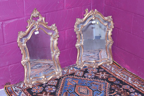 Pair twentieth century Italian giltwood framed wall mirrors with floral scroll crestings and