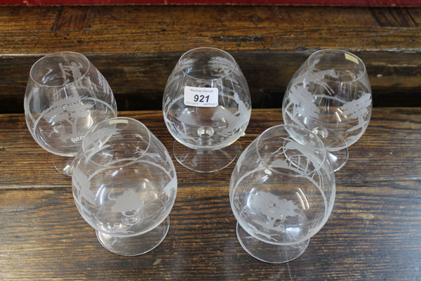 Five glass brandy balloons with etched hunting scene decoration