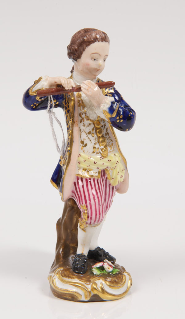 Nineteenth century Derby figure of a flautist, on scroll base, 11.5cm high CONDITION REPORT Head
