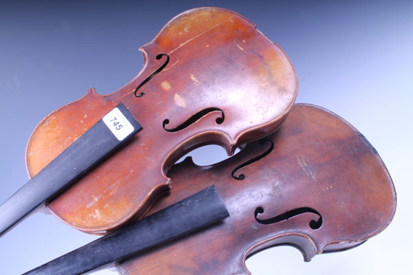 Two antique violins bearing labels - 'Wilhelm Nurnberger fecit Mantua 1735' and 'Antonius