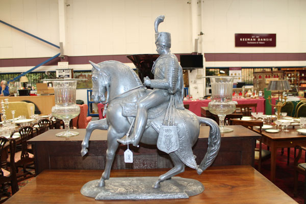 Impressive mid-twentieth century cast metal figure of a Georgian Hussar officer on horseback, with