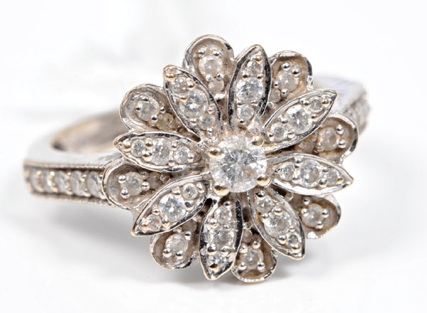 Ladies' white gold and diamond flower-head shaped cluster ring, box and receipts