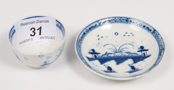 Eighteenth century Caughley miniature blue and white tea bowl and saucer with Chinese landscape