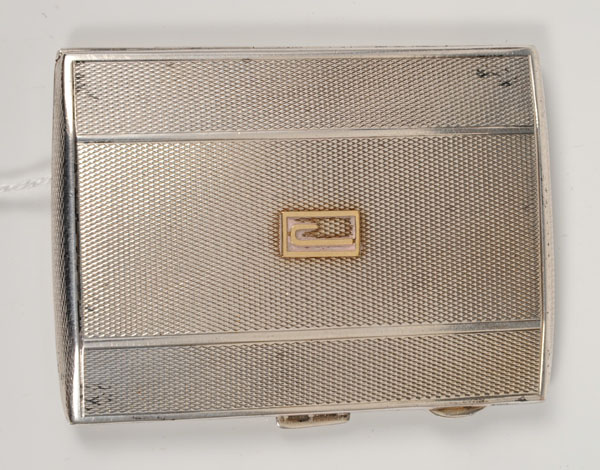 1930s silver cigarette case of rectangular form, with engine-turned decoration, raised yellow