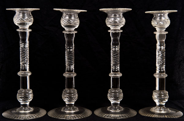 Set of four good quality nineteenth century cut glass candlesticks with spiral twist and knopped