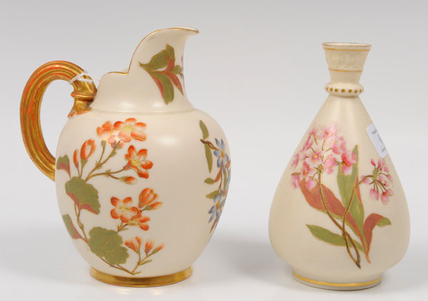 Victorian Royal Worcester jug with painted floral sprigs on cream ground and gilt loop handle and