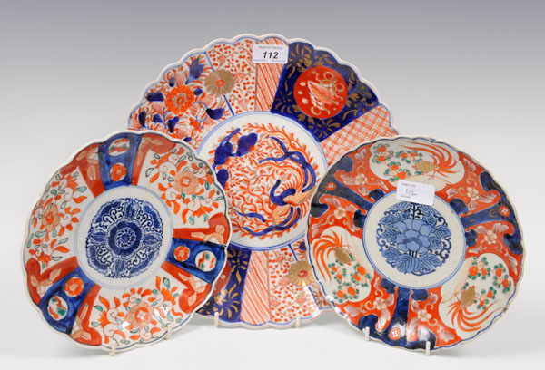 Late nineteenth century Japanese fluted Imari charger and pair similar plates with bird and floral