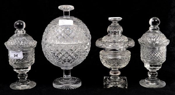 Pair George IV cut glass sweet jars and covers with diamond and slice cut decoration, on star cut