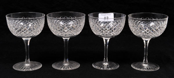 Set of twelve good quality Edwardian cut glass champagne bowls, with diamond cut decoration and star