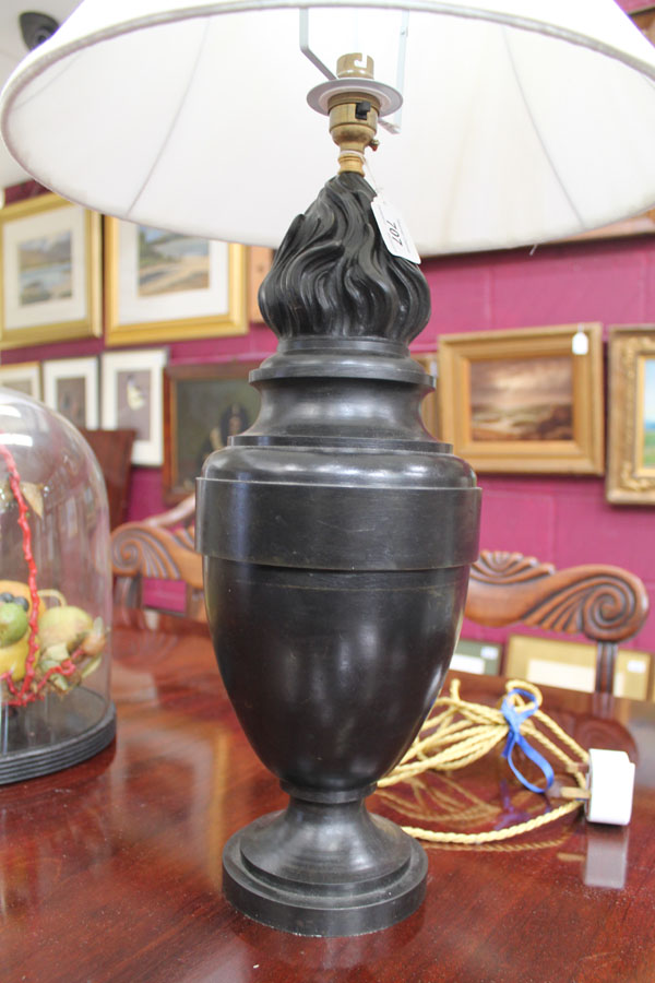 Pair of early twentieth century French bronze urn and flame-shaped table lamps on circular bases,