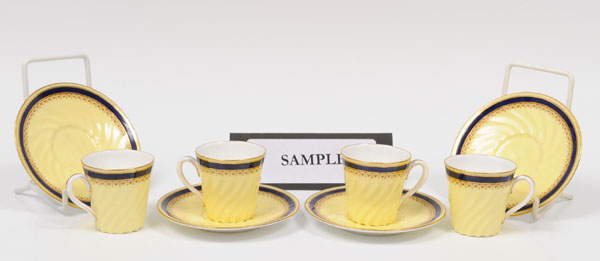 Late Victorian Royal Worcester porcelain coffee set with spiral moulding and blue and gilt band on