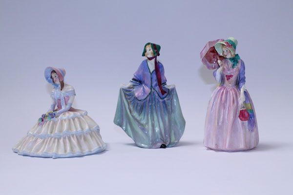 Three Royal Doulton figures - Sweet Anne HN1318, Miss Demure HN1402 and Day Dreams HN1731