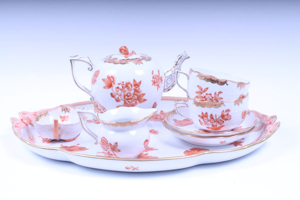 Herend porcelain tea-for-two set with orange floral decoration comprising shaped tray, two cups, two