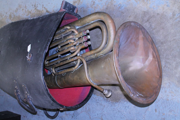 'Renown' brass / copper tuba distributed by Dallas, London, in a black carrying case