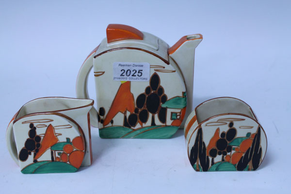 Clarice Cliff Fantasque range hand-painted three piece teaset, decorated with house and orange and