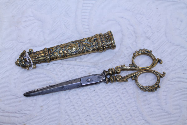 Pair Victorian steel scissors with decorative brass handles and foliate decorated brass sheath