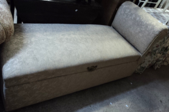 A 5’4” early 20th Century day bed ottoman with ratchet action