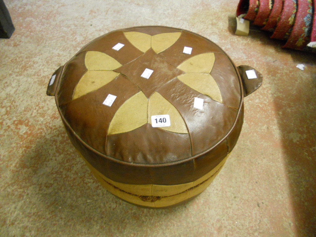 A mid 20th Century leatherette pouffe